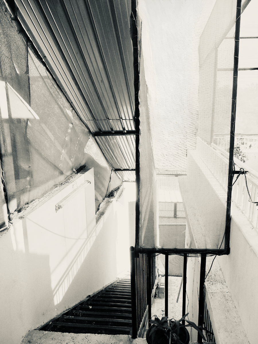 stairs leading down to an outdoor car park